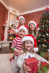 Obraz na płótnie Canvas little kids in christmas