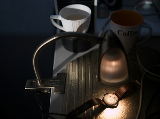 Coffee and wrist watch