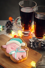 New Year's gingerbread in the form of a pig decorated with icing