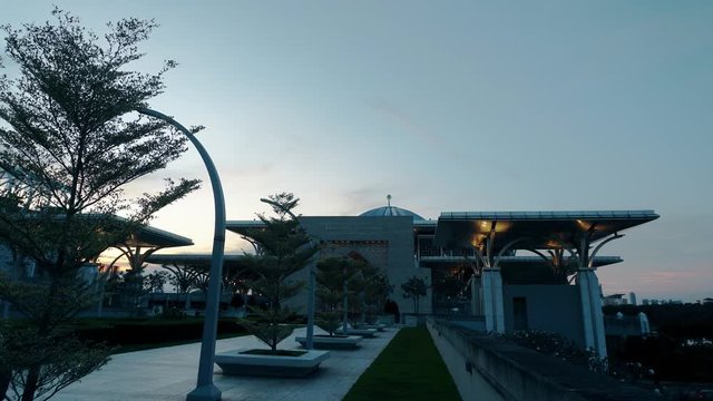 Beautiful sunset time lapse view of Tuanku Mizan Zainal Abidin Mosque or Iron Mosque by the Putrajaya lake in Putrajaya, Malaysia.UHD Static