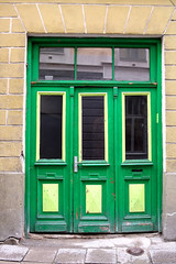 Fototapeta na wymiar Green door in old building, Tallinn, Estonia