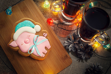 New Year's gingerbread in the form of a pig decorated with icing