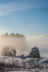 Obraz na płótnie Canvas Winter sunny day on Lake Vodlozero in the Vodlozersky National Park in Karelia (Russia)