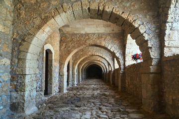 Fototapeta na wymiar a stone cloister of a historic monastery Orthodox Moni Arcadia on the island of Crete.