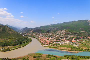 Fototapeta na wymiar Aerial view on old town Mtskheta and confluence of the rivers Kura and Aragvi in Georgia