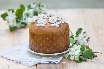  traditional italian pannetone cake decorated with flowers of apple tree