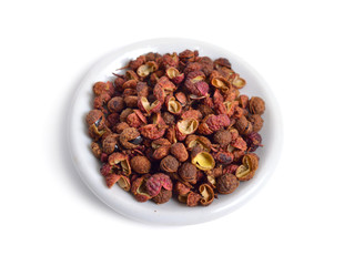 Sichuan pepper, Sichuan peppercorn, Szechuan pepper or Szechuan peppercorn isolated on white background
