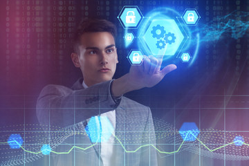 The concept of business, technology, the Internet and the network. A young entrepreneur working on a virtual screen of the future and sees the inscription: