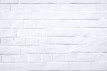 Naklejka premium White wall with brickwork texture
