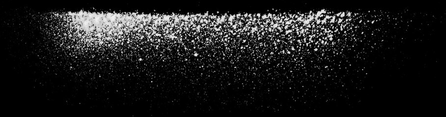 Realistic grunge graffiti spray paint effect on the black background. Isolated white ink texture.