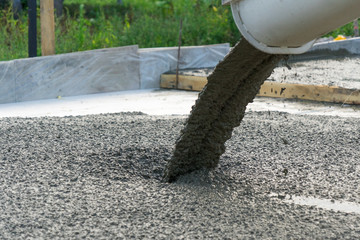 Pouring concrete Foundation. Slab Foundation. Place for your text.