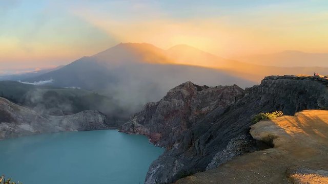 Beautiful sunrise at the top of volcano Kawah Ijen, East Java, Indonesia, Asia