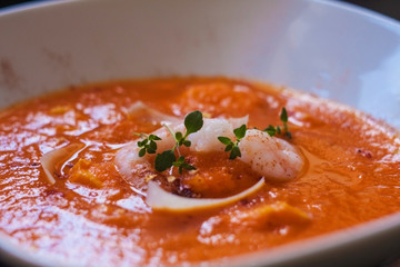 Bouillabaisse soup. Delicious fish soup with shimps, fish fillet and vegetables.