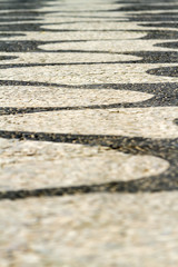 Typical sidewalk with waves of the coastal walk of Copacabana in Rio de Janeiro, Brazil