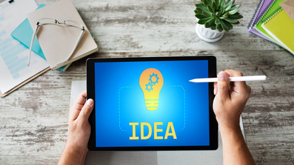 New idea, creativity and innovation concept with lamp icon on screen.