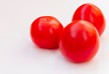 Fresh tomatoes isolated on white background with space for text