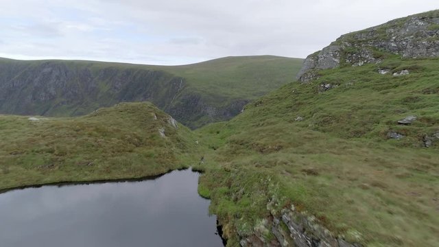 A Scenic View of the Lake and Mountains