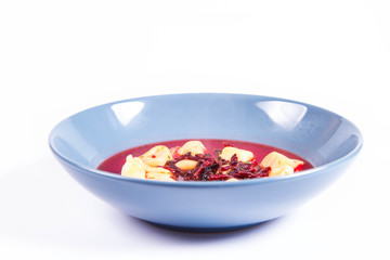 Traditional polish Christmas Eve dish: red borscht with uszka (a mushroom filled kind of dumplings)