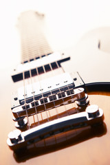 CLOSE UP OF ELECTRIC SEMI ACOUSTIC GUITAR