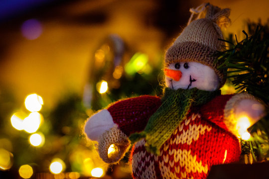 Sitting Snowman Christmas Decoration on Hearth with Lights
