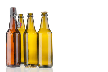 Empty beer bottles isolated on white background