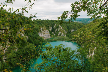 Travel to Croatia. Top view of the Plitvice Lakes - a popular Croatian national park of incredible beauty with lots of greenery, lakes and waterfalls