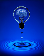 HUMAN BRAIN INSIDE GLASS ELECTRIC LIGHT BULB FLOATING ABOVE POOL OF BLUE WATER DROP WITH RIPPLES