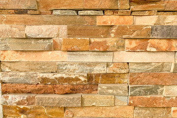 Yellow brick stone wall (background)