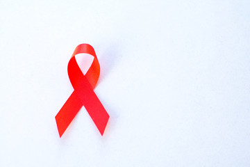 Red ribbon with World Aids day concept.