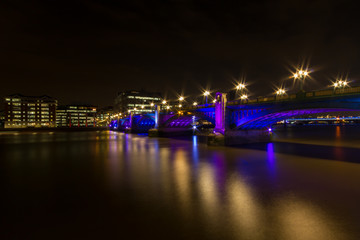 Fototapeta na wymiar The Southwark Bridge at night