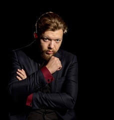 man with a beard on a black background