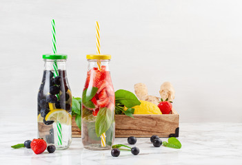 Herbs and fruits flavored infused water. Summer refreshing drink