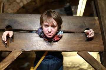 Woman in pillory