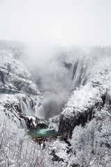 Plitvice lakes, National park in Croatia, during winter, covered with snow 