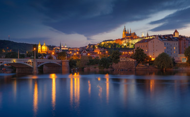 Fototapeta na wymiar Prague Castle and manes bridge in Czech Republic at the sunset. Typical Panorama