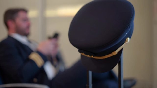 airman writes a message on the phone, searches for information
