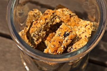 Homemade rusks in a glass jar. This is a popular South African food which is eaten with tea or coffee. 