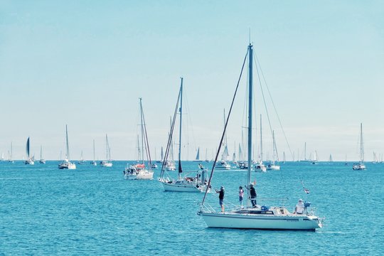 sailing boats are leaving the city marina for the atlantic crossing regatta race ARC 2018 on a sunny day