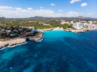 Fototapeta na wymiar Aerial view, coast with hotels and villas, Cala Tropicana and Cala Domingos, Porto Colom region, Mallorca, Balearic Islands, Spain