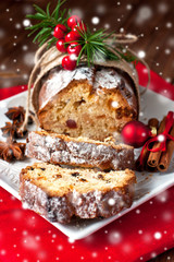 Still life with tasty cake portion. Christmas stollen with several ingredients
