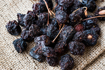 Pile of Dried Cherries on Sack Ready to Eat.