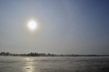 Fototapeta na wymiar Winter emptiness. Winter sunset. View of the frozen Dnieper River.