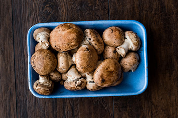 Portobello Raw Cremini Mushrooms in Plastic Container Package or Box.