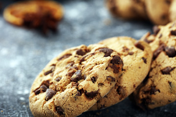 Chocolate cookies on rustic table. Chocolate chip cookies shot