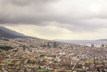Fototapeta na wymiar Aerial view of the colonial sector of the city of Quito in Ecuador, next to the Pichincha volcano