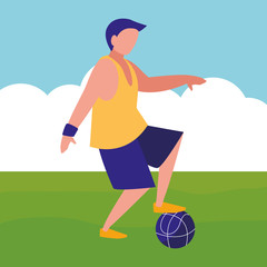 young man playing soccer