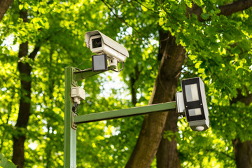 Security surveillance camera in the park