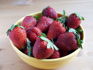 Strawberries in a yellow bowl