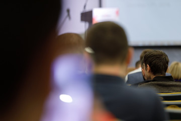 Audience at the conference hall. Business conference