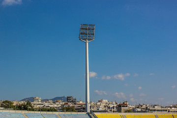 empty football stadium complex and led light projector in summer bright day time clear weather 